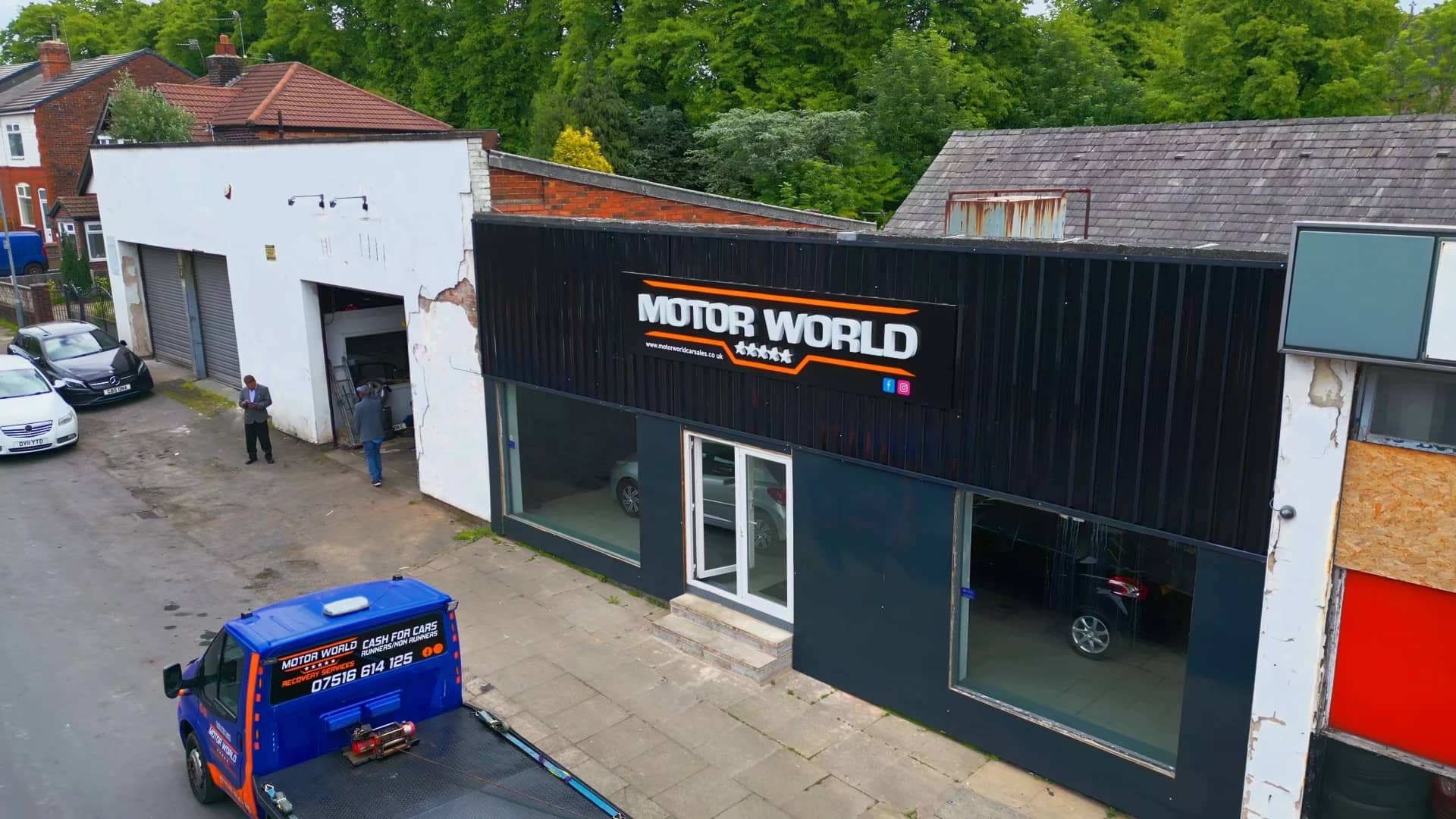 Low-angle aerial view of the MotorWorld unit from the side