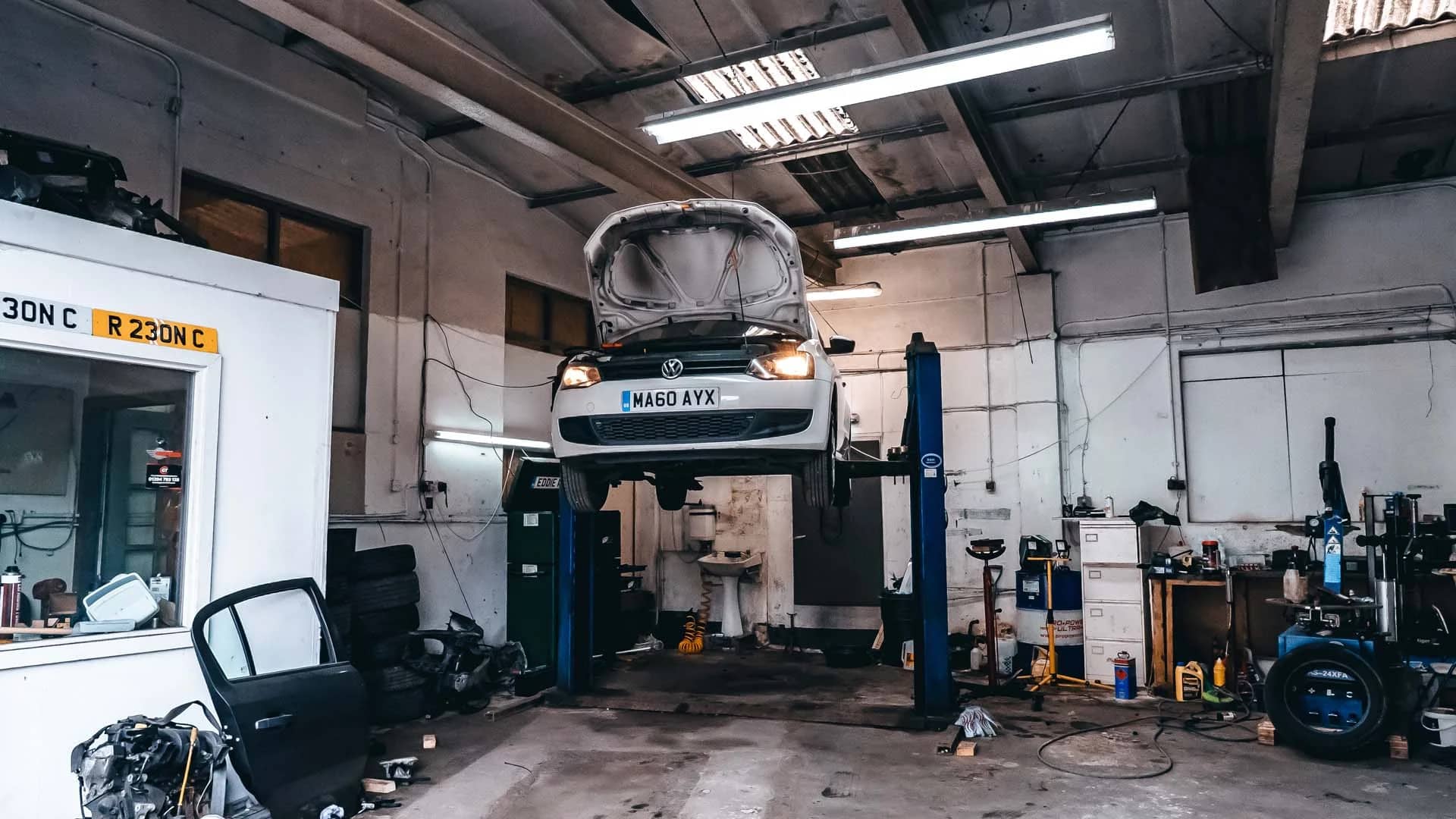 Car elevated on the MOT bay at MotorWorld, viewed from the front