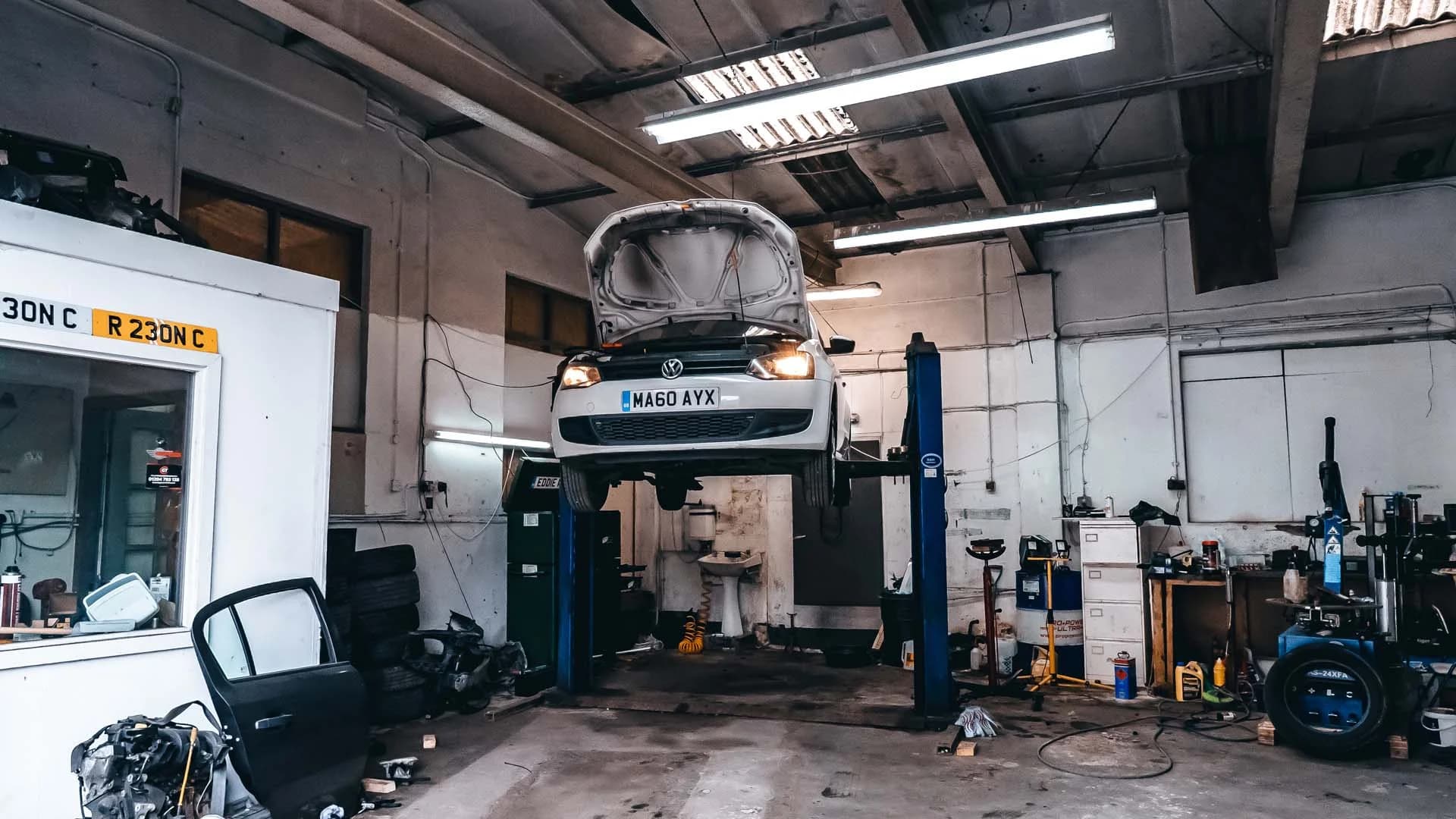 Car elevated on the MOT bay at MotorWorld, viewed from the front